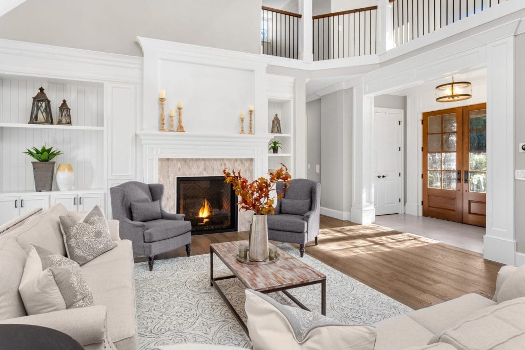 Stock image of a prefab fireplace being used.